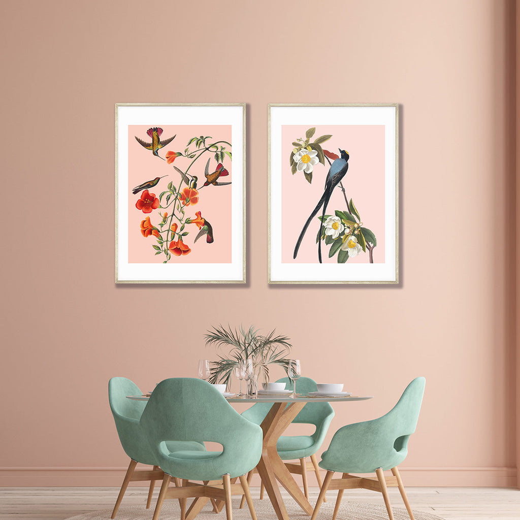 prints on wall above dining table