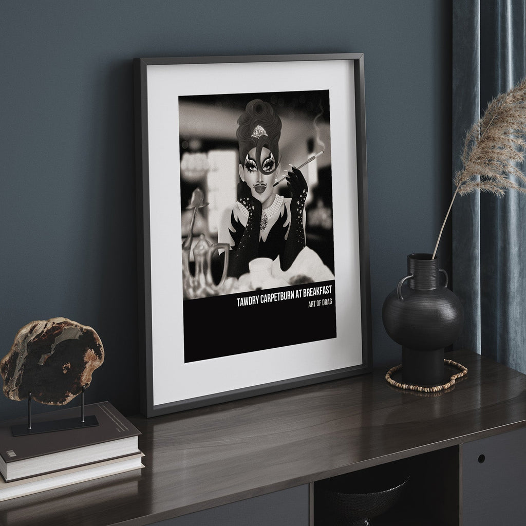 A framed art print featuring a Drag Queen in monochrome, leaning against a wall.