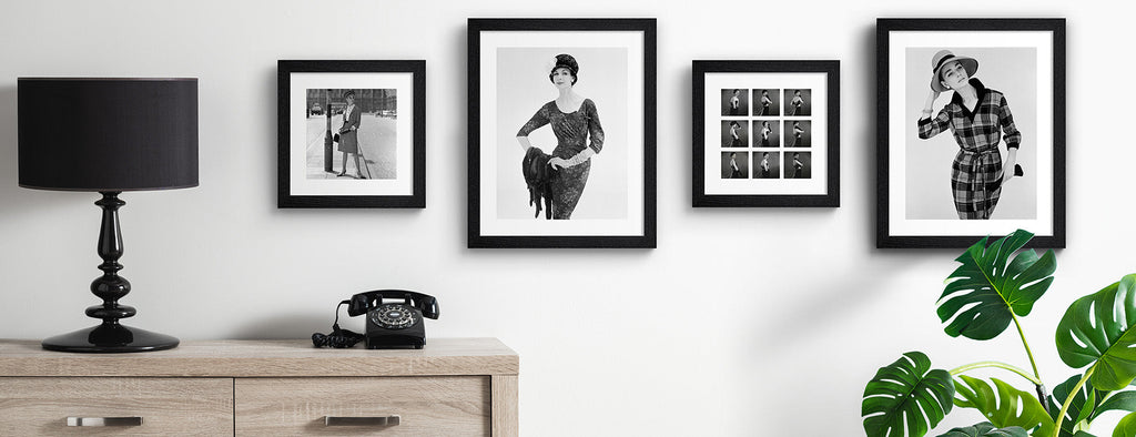 John French photography wall art prints hung up on a white wall.