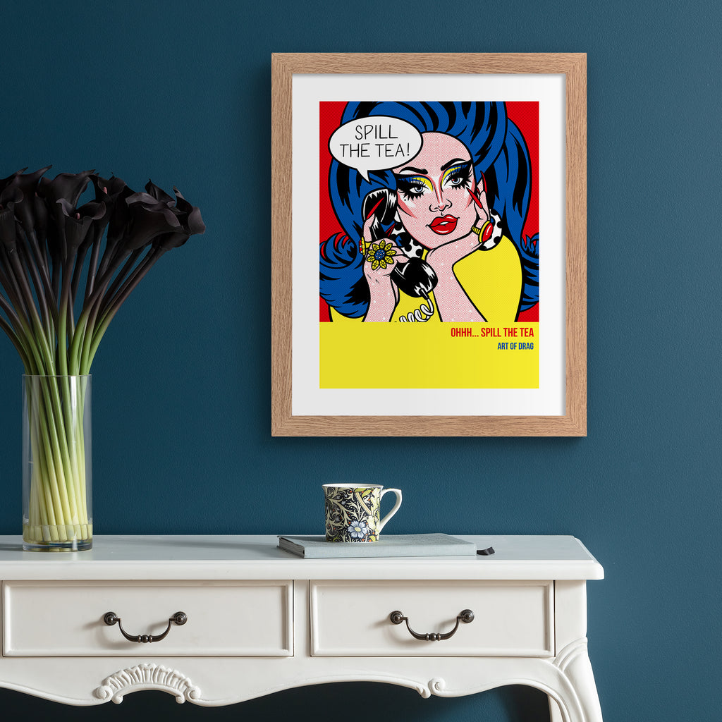 Reimagined art print featuring a Drag Queen in 'pop art' style, hung up on a blue wall.