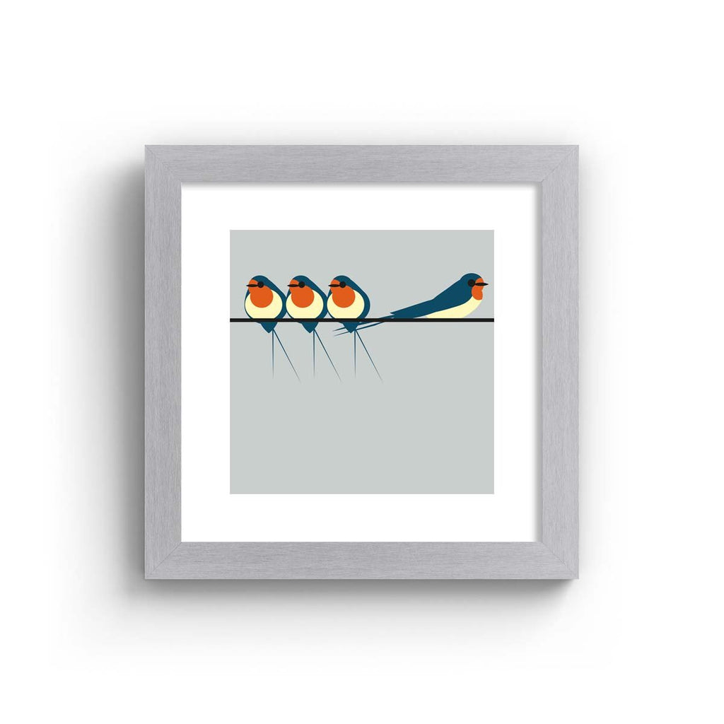 Minimalistic art print featuring three swallows perching on a line, in front of a blue background. Art print is in a grey frame.