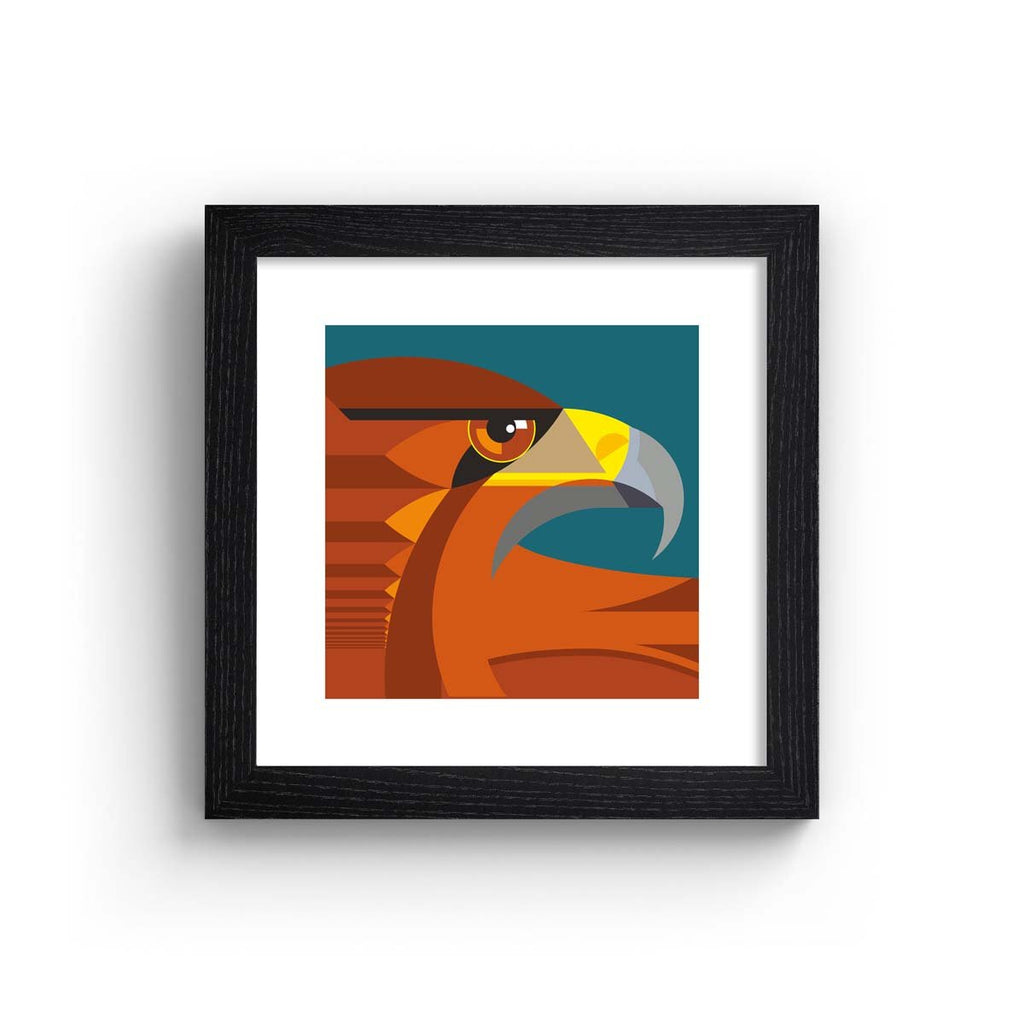 Minimalistic art print featuring a fierce golden eagle in front of a deep blue background, in a black frame.