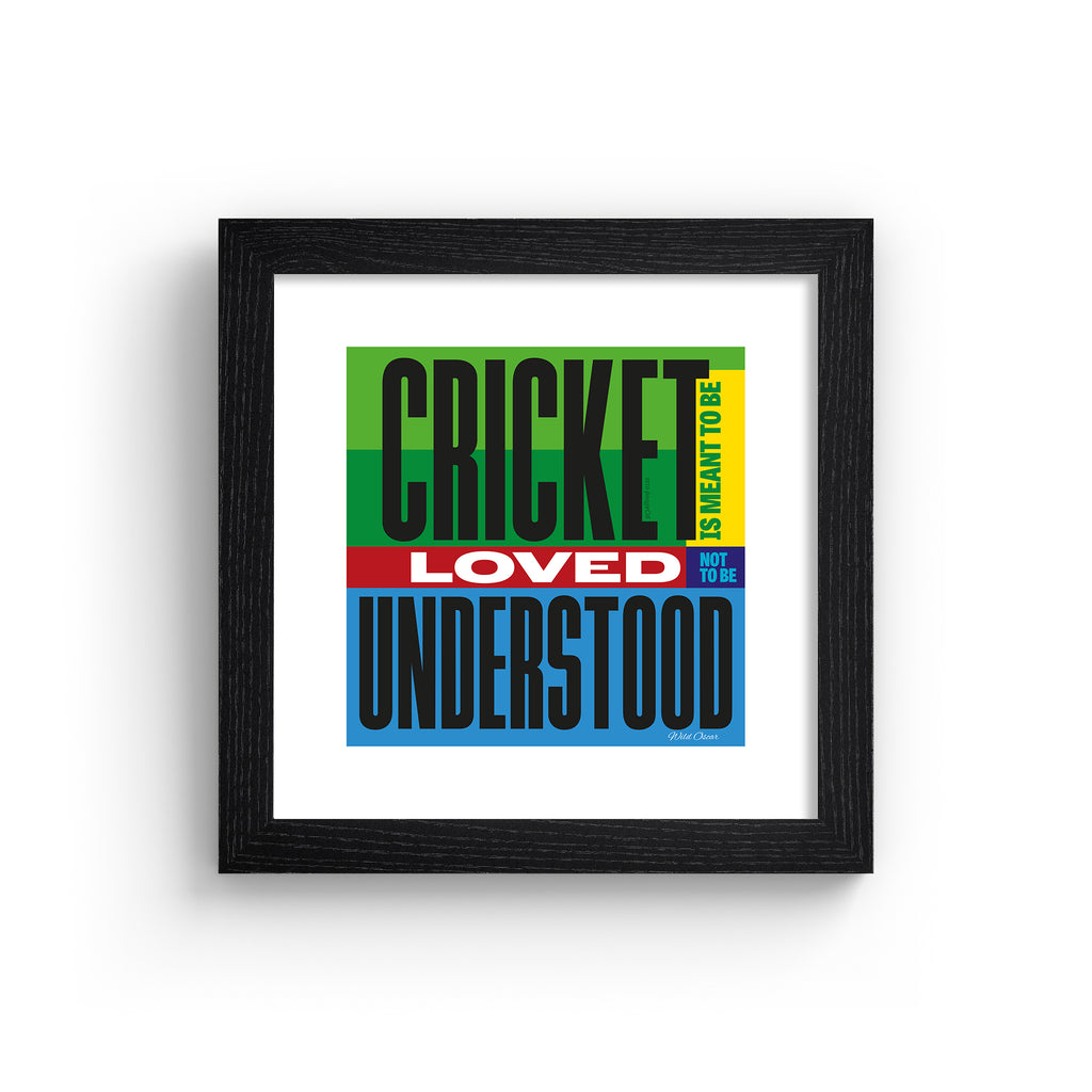 Typography art print celebrating cricket, on a bright green, blue, yellow and red background. Typography reads 'Cricket Is Meant To be Loved, Not To Be Understood'. Art print is in a black frame.