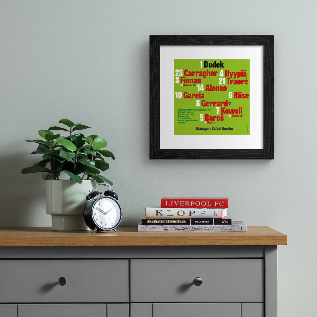 Bright green art print featuring typography celebrating the Liverpool 2005 team, on a bright green background. Art print is hung up on a grey wall.