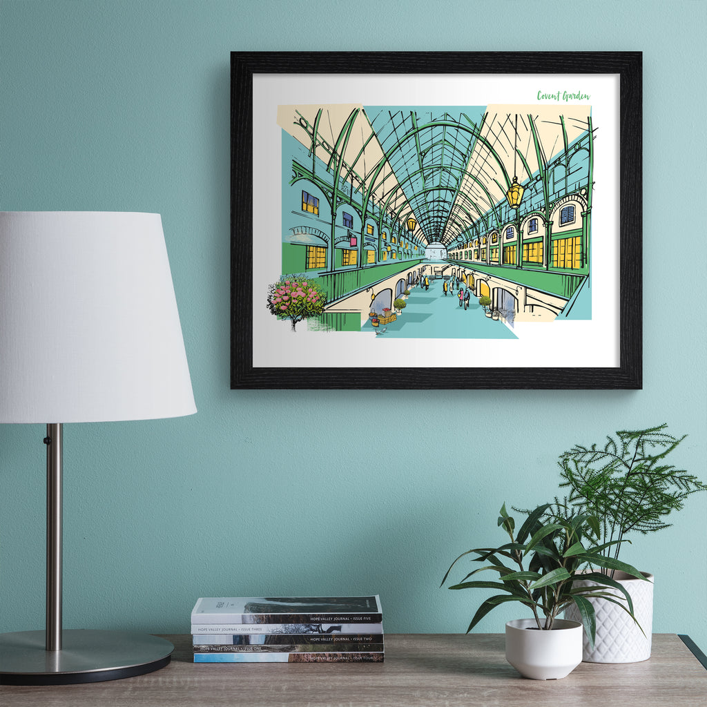 Colourful travel art print of Covent Garden in London, featuring the inside of the brightly lit building and some flowers blooming out of the frame. Text in the top right corner reads 'Covent Garden'. Art print is hung up on a blue wall.