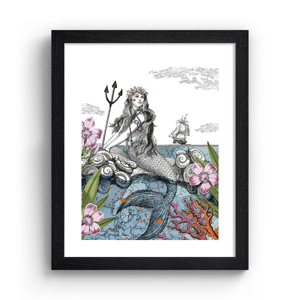 Emotive art print featuring a thoughtful mermaid basking in the shallows, surrounded by nature, with a ship sailing in the background. Art print is in a black frame.