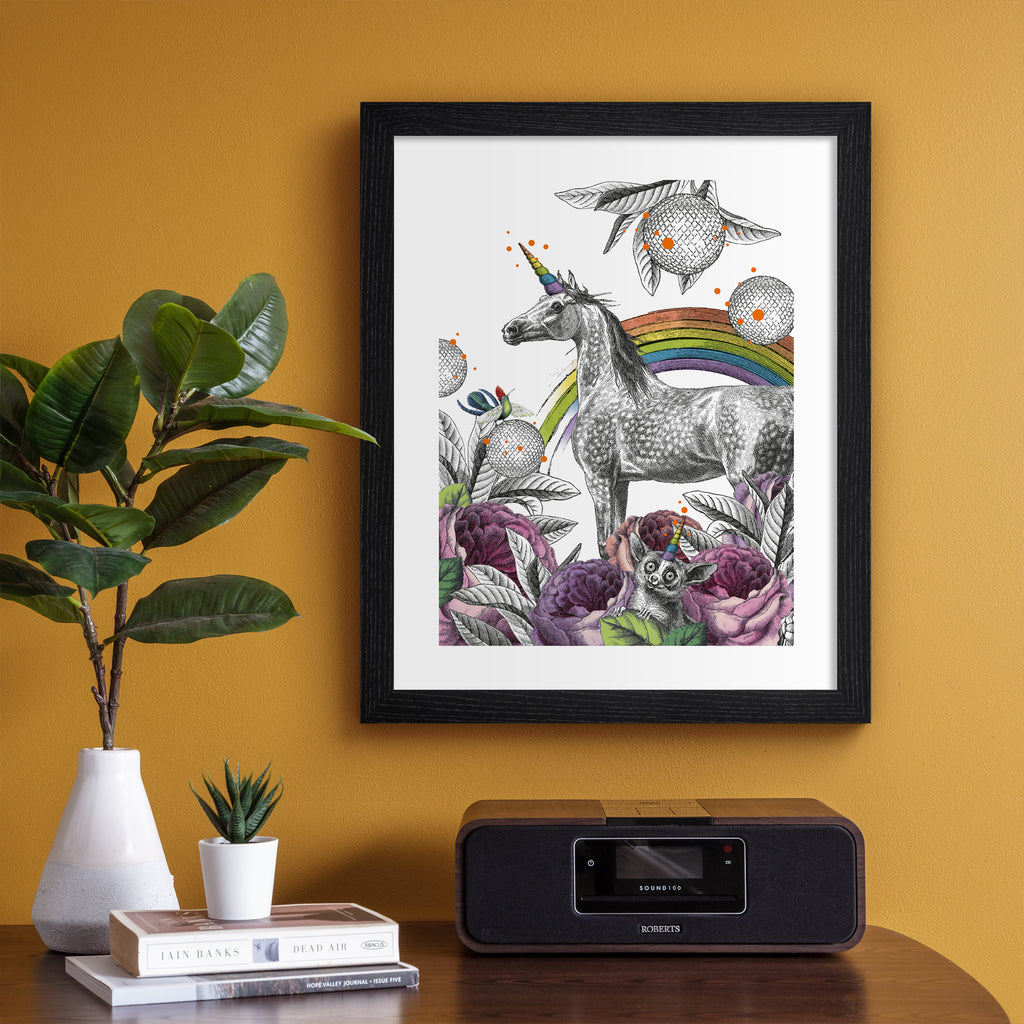 Eclectic art print featuring a unicorn standing amidst a beautiful nature scene. Art print is hung up on an orange wall.