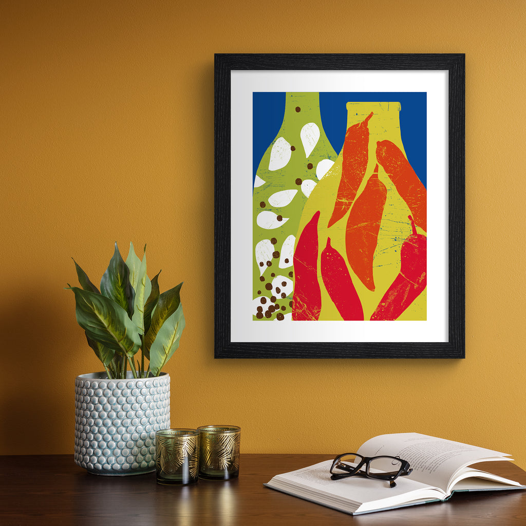 Bright art print featuring two patterned bottles of infused oil, in front of a bright blue background. Art print is hung up on an orange wall.