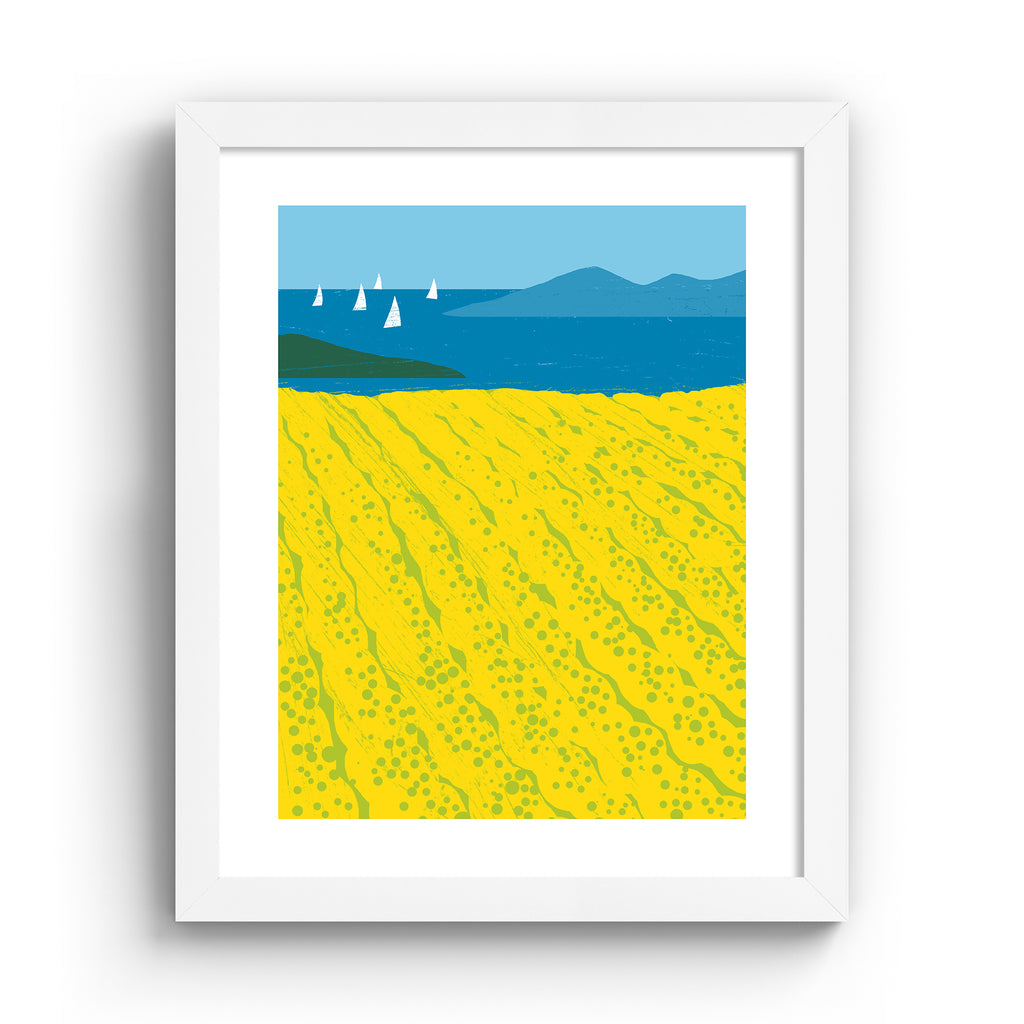 Minimalistic art print featuring beautiful yellow fields bordered by a coastal view.  Art print is in a white frame.