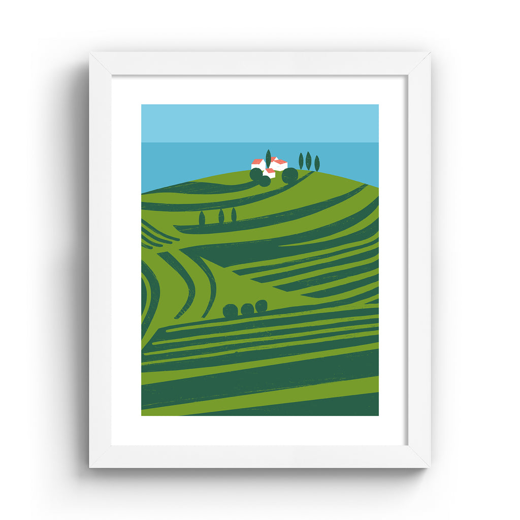 Vivid art print containing a sweeping scene of vineyards on the coast. Art print is in a white frame.