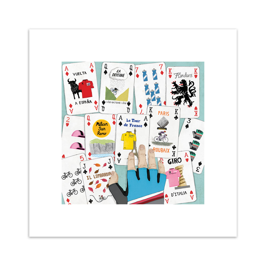 Art print featuring a deck of cards splayed out on a table.