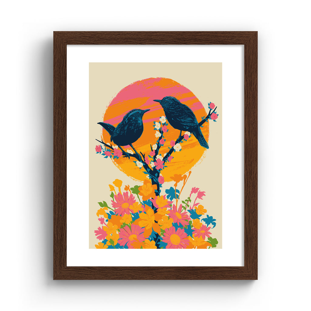 Brilliant art print featuring a detailed illustration of two birds perching on a blooming tree, in front of a bright sunset. Art print is in an oak frame.