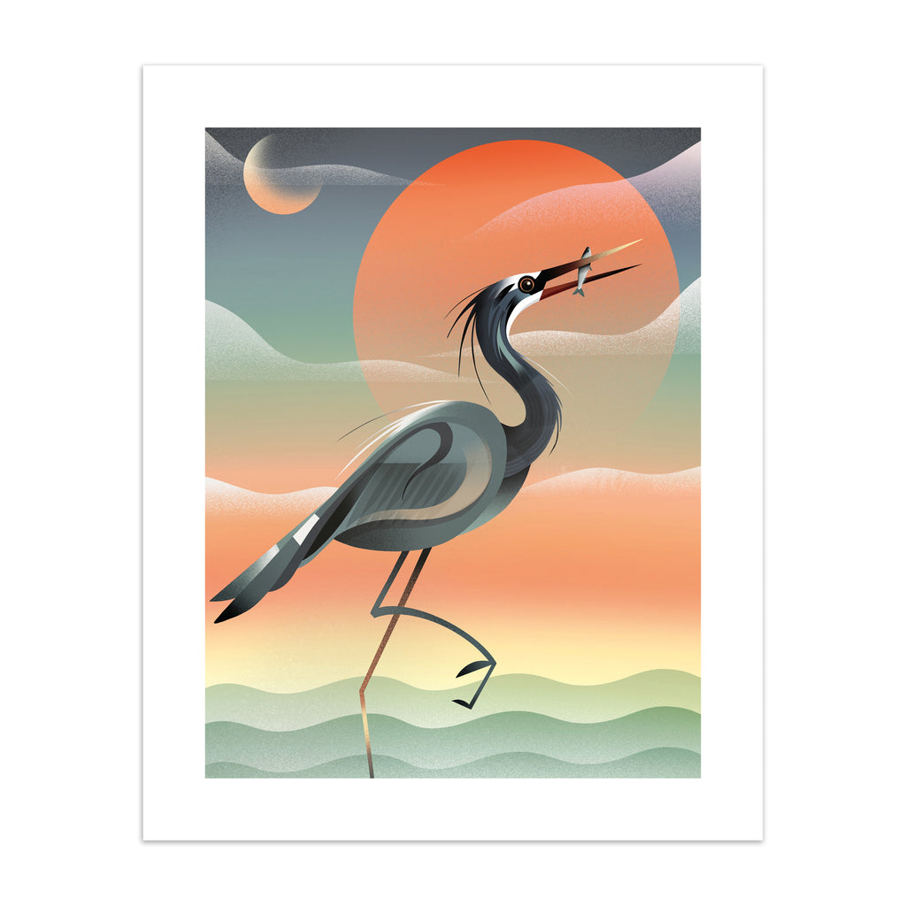 Striking art print featuring a grey heron posing in front of a stunning red sunset by the water.
