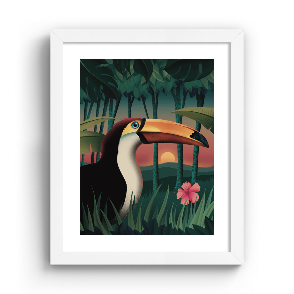 Vibrant art print featuring a sunset forest scene of a toucan standing amidst the trees. Art print is in a white frame.