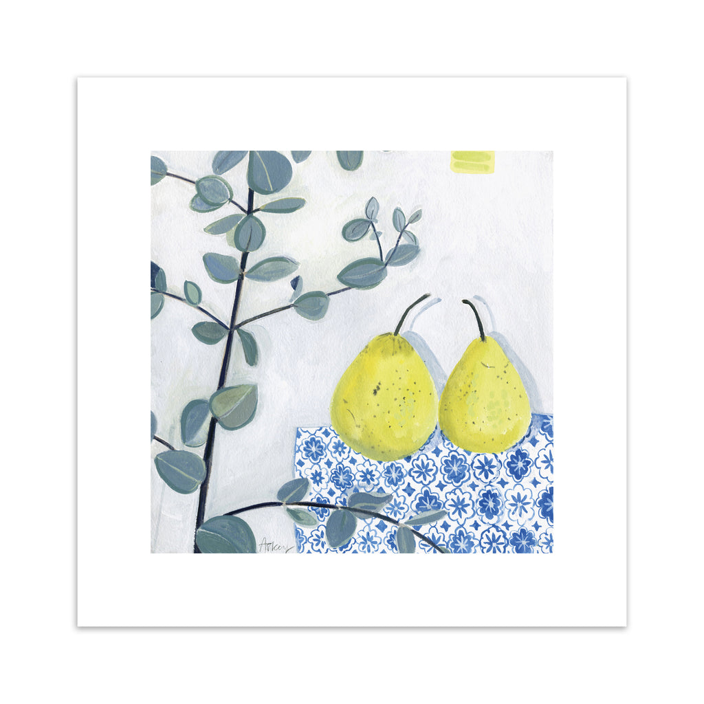 Minimalistic art print featuring two pears laid out on a blue patterned tablecloth. 