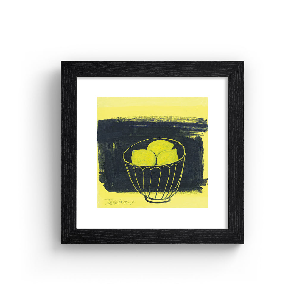 Minimalistic art print featuring lemons in a fruit bowl in front of a bright yellow and black background. Art print is in a black frame.