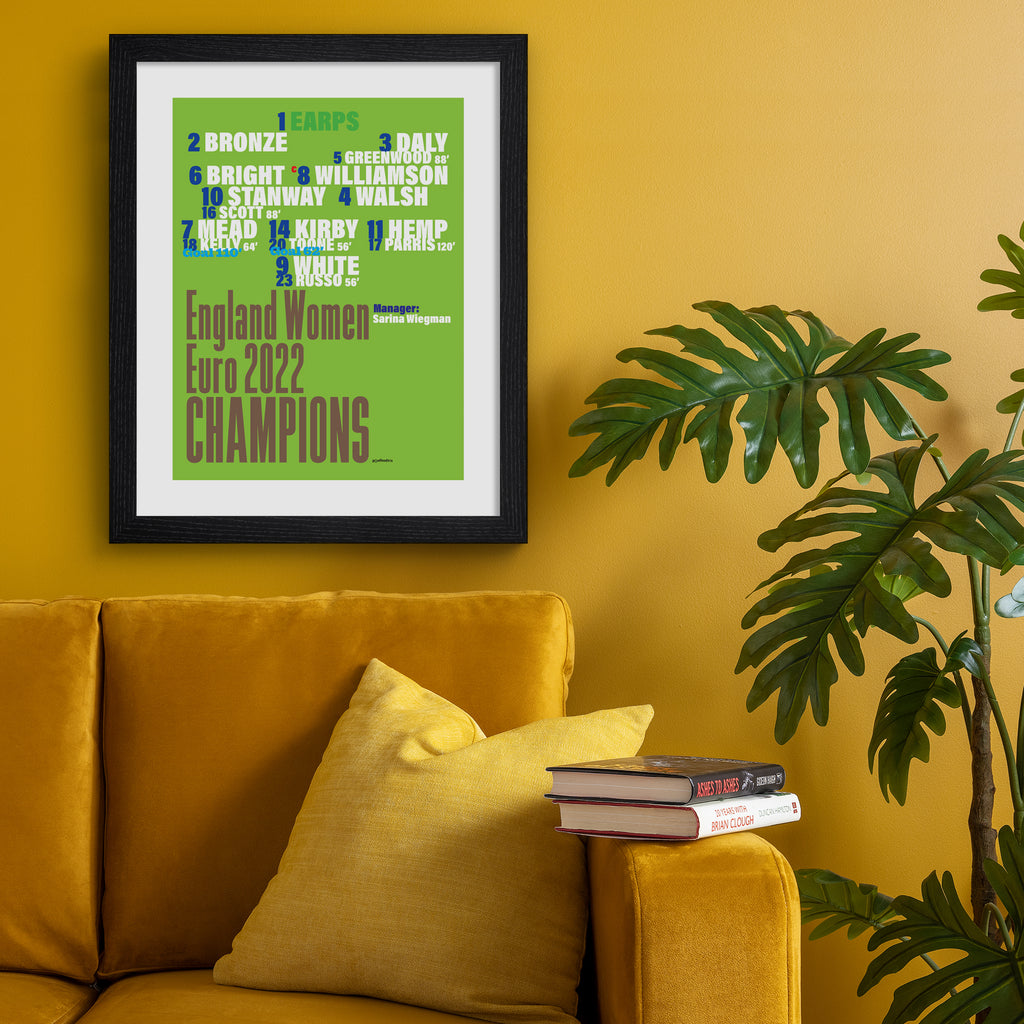 Sporty art print featuring typography celebrating the Lionesses England football team, on a bright green background. Art print is hung up on an orange wall.