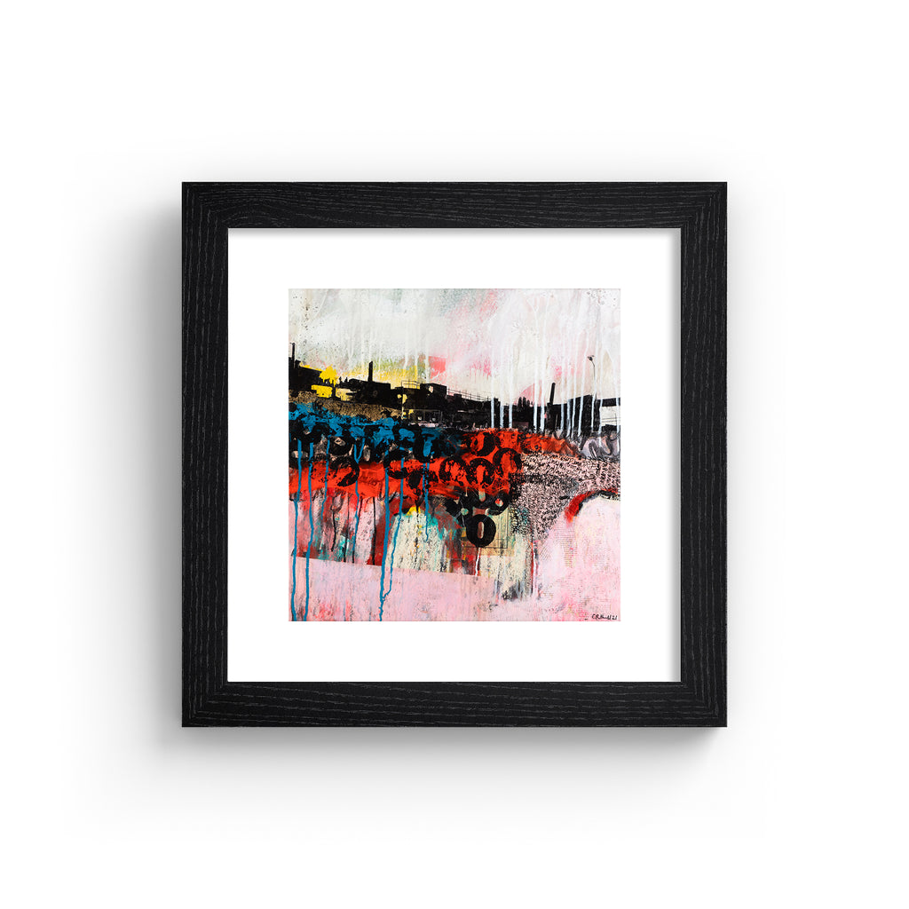 Abstract art print featuring an urban landscape against a brightly coloured background and black graffiti letters. Art print is in a black frame.