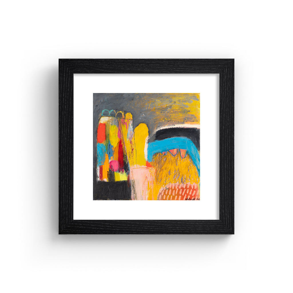 Vivid abstract print featuring an urban array of mixed colours on a dark background. Art print is in a black frame.