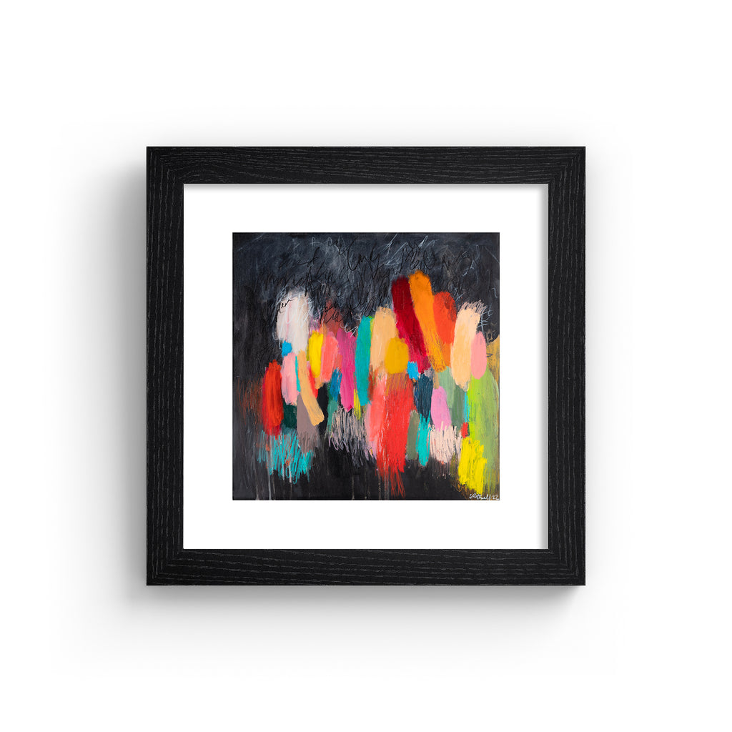 Vivid abstract print featuring a vast array of colours blended together on a moody background. Art print is in a black frame.
