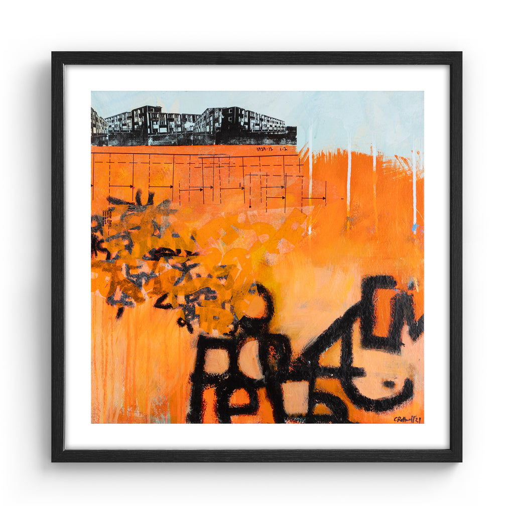 Large vivid abstract print featuring an urban landscape covered in bright orange and black graffiti spray paint. Art print is in a black frame.