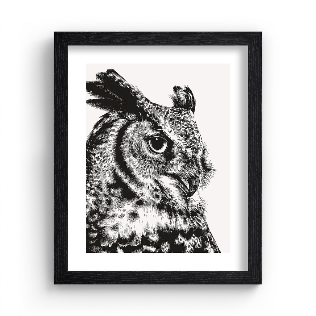 Striking art print featuring a detailed illustration of a great horned owl, in black and white. Art print is in a black frame.