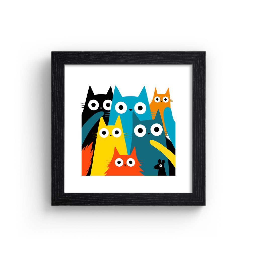 Colourful art print featuring different coloured cats and a mouse posing in the frame. Art print is in a black frame.