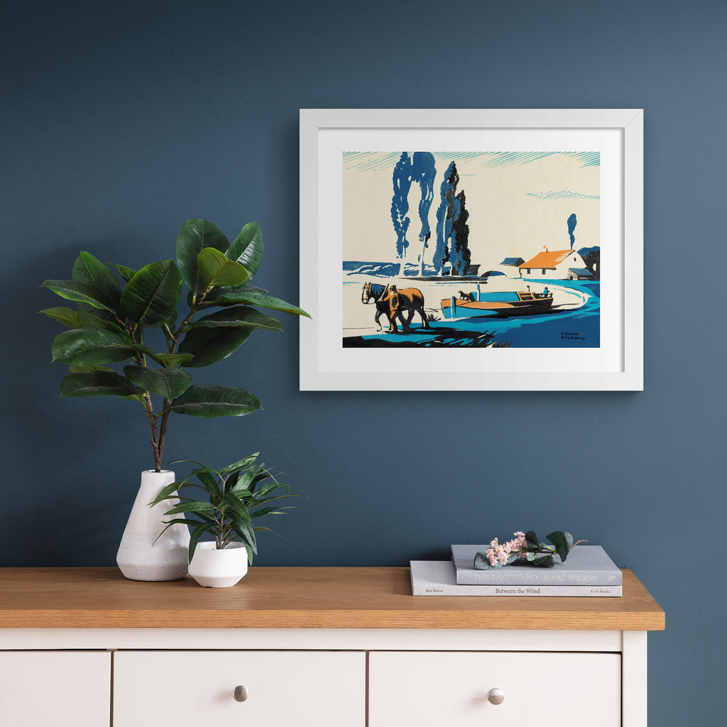 Classical watercolour art print featuring a horse pulling a boat along a shore, hung up on a blue wall.