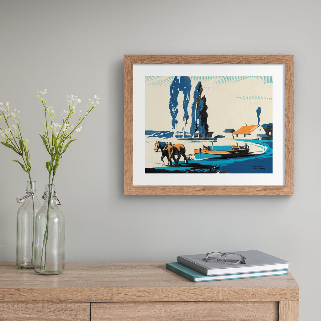 Classical watercolour art print featuring a horse pulling a boat along a shore, hung up on a beige wall.
