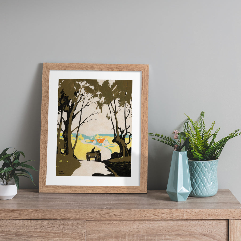 Classical watercolour art print featuring a horse drawn carriage ambling down a road towards a town, leaning against a beige wall.